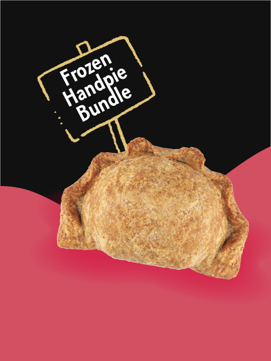 A handpie with a tiny sign on top which reads