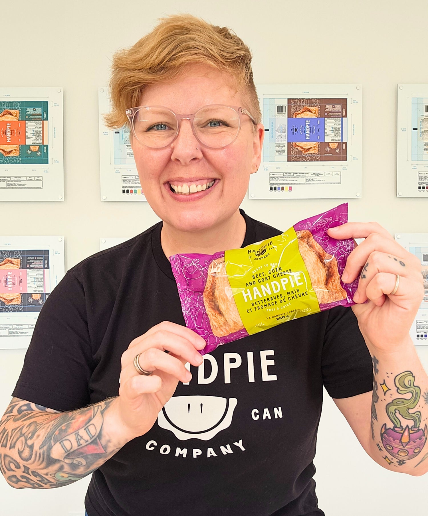 Red Seal Chef and Handpie Founder Sarah Bennetto O’Brien holding a Beet, Corn, and Goat Cheese handpie.