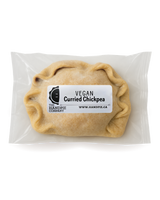 A Vegan Curried Chickpea Handpie in it's packaging